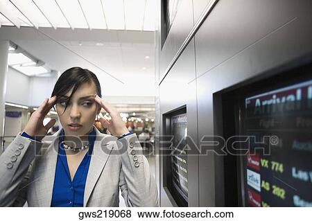 Businesswoman suffering from a headache View Large Photo Image Stock Photo - Businesswoman suffering from a headache. Fotosearch
