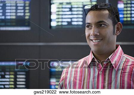 Close-up of a businessman smiling View Large Photo Image Stock Image - Close-up of a businessman smiling. Fotosearch