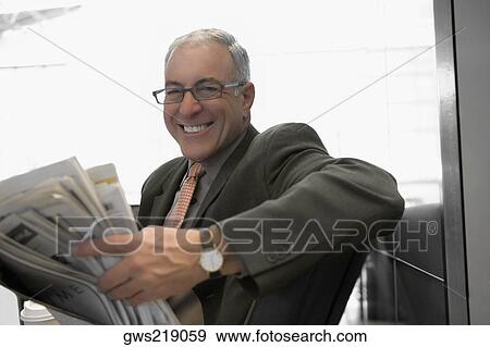 Stock Photo - Portrait of a businessman smiling. Fotosearch