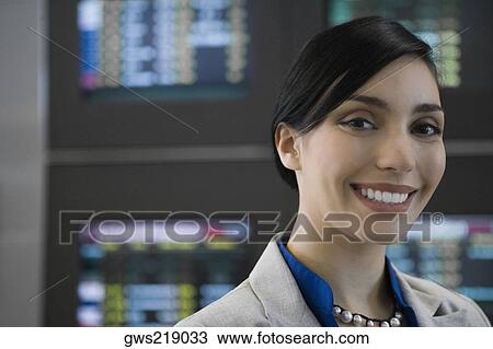 Portrait of a businesswoman smiling View Large Photo Image Stock Image - Portrait of a businesswoman smiling. Fotosearch