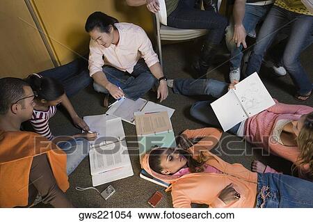 High angle view of university students studying together View Large Photo Image Picture - High angle view of university students studying together. Fotosearch