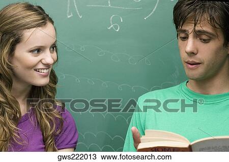 University students studying in a classroom View Large Photo Image Stock Image - University students studying in a classroom. Fotosearch