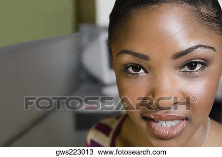 Portrait of a young man smiling View Large Photo Image Stock Image - Portrait of a young man smiling. Fotosearch