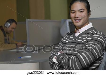 Portrait of a young man smiling View Large Photo Image Stock Image - Portrait of a young man smiling. Fotosearch