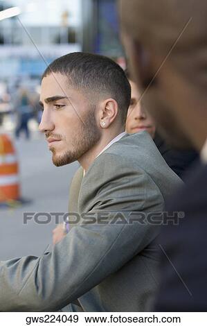 Stock Photo - Side profile of a businessman thinking. Fotosearch