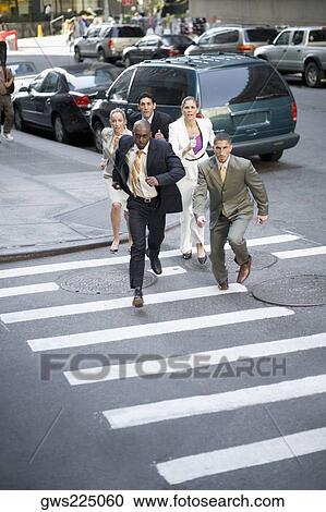 Business executives chasing a businessman View Large Photo Image Stock Image - Business executives chasing a businessman. Fotosearch