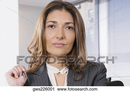 Portrait of a businesswoman View Large Photo Image Stock Image - Portrait of a businesswoman. Fotosearch