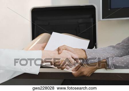 Businesswomen shaking hands View Large Photo Image Stock Photo - Businesswomen shaking hands. Fotosearch