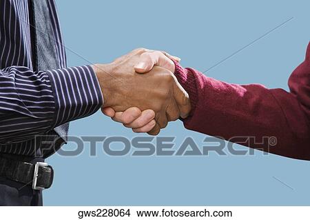 Close-up of two businessmen's shaking hands View Large Photo Image Picture - Close-up of two businessmen's shaking hands. Fotosearch
