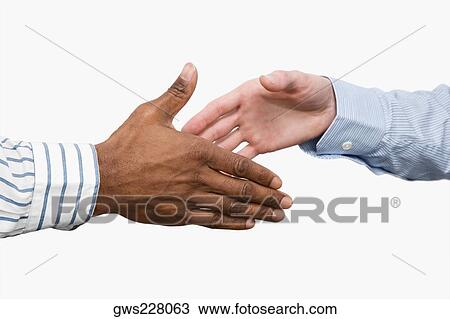Close-up of two businessmen's shaking hands View Large Photo Image Stock Image - Close-up of two businessmen's shaking hands. Fotosearch