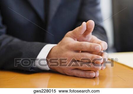 Mid section view of a businessman View Large Photo Image Stock Photography - Mid section view of a businessman. Fotosearch
