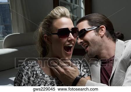 Young couple laughing View Large Photo Image Stock Photography - Young couple laughing. Fotosearch