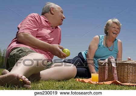 Senior couple at picnic View Large Photo Image Stock Photo - Senior couple at picnic. Fotosearch