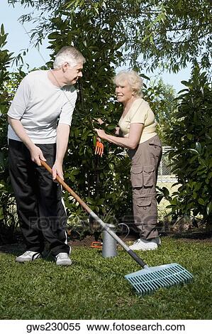 Stock Photography - Senior couple gardening together. Fotosearch