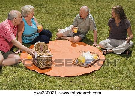 Two senior couples at picnic View Large Photo Image Stock Image - Two senior couples at picnic. Fotosearch