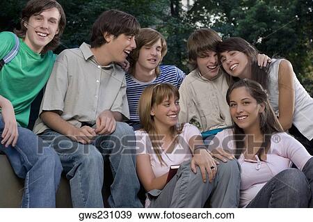 School friends smiling together View Large Photo Image Stock Photo - School friends smiling together. Fotosearch