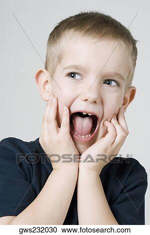 Close-up of a boy shouting View Large Photo Image Stock Image - Close-up of a boy shouting. Fotosearch