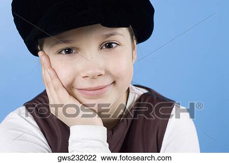 Close-up of a girl with her head in her hands View Large Photo Image Stock Image - Close-up of a girl with her head in her hands. Fotosearch