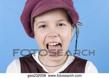 Close-up of a girl with her open mouth View Large Photo Image Stock Photo - Close-up of a girl with her open mouth. Fotosearch