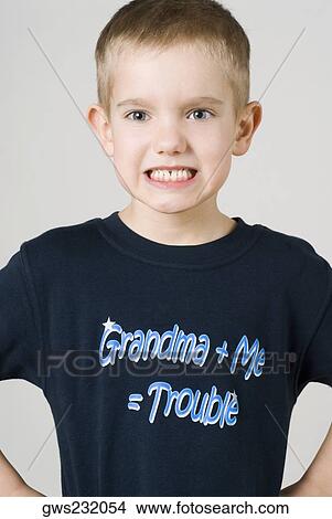 Portrait of a boy clenching his teeth View Large Photo Image Picture - Portrait of a boy clenching his teeth. Fotosearch