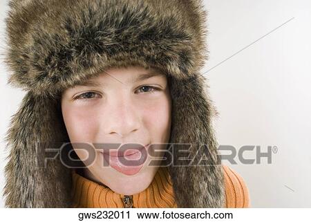Portrait of a boy sticking his tongue out View Large Photo Image Stock Image - Portrait of a boy sticking his tongue out. Fotosearch