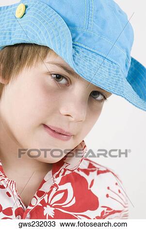 Portrait of a boy wearing a cowboy hat View Large Photo Image Stock Image - Portrait of a boy wearing a cowboy hat. Fotosearch