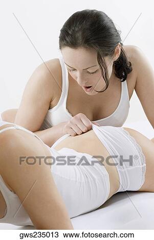 Female homosexual couple doing sexual activity on the bed View Large Photo Image Stock Image - Female homosexual couple doing sexual activity on the bed. Fotosearch