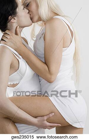 Female homosexual couple kissing each other View Large Photo Image Stock Photography - Female homosexual couple kissing each other. Fotosearch