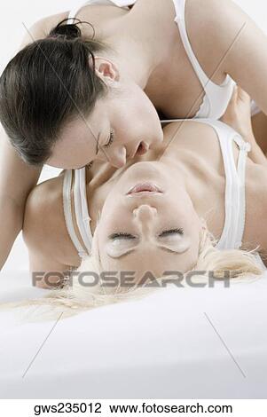 Female homosexual couple romancing on the bed View Large Photo Image Stock Image - Female homosexual couple romancing on the bed. Fotosearch