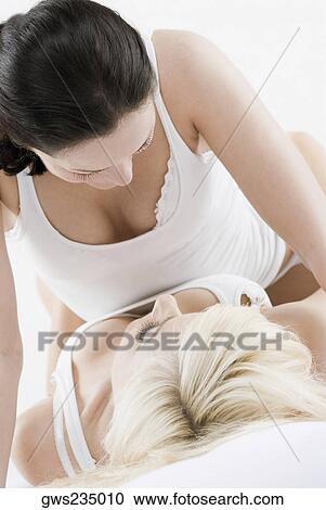 Female homosexual couple romancing View Large Photo Image Stock Image - Female homosexual couple romancing. Fotosearch