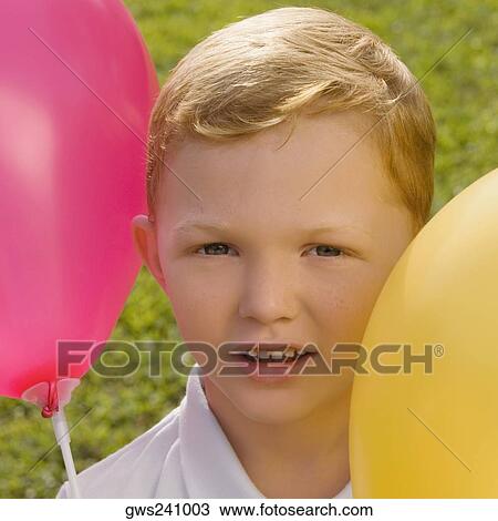 Portrait of a boy with balloons View Large Photo Image Stock Image - Portrait of a boy with balloons. Fotosearch