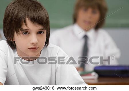 Close-up of a school student View Large Photo Image Stock Photograph - Close-up of a school student. Fotosearch