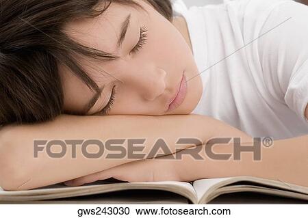 Stock Image - Close-up of a schoolboy sleeping. Fotosearch