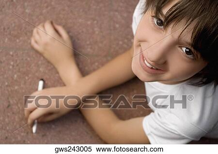Portrait of a schoolgirl smiling View Large Photo Image Stock Photography - Portrait of a schoolgirl smiling. Fotosearch