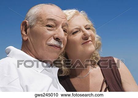 Stock Image - Close-up of a senior couple. Fotosearch