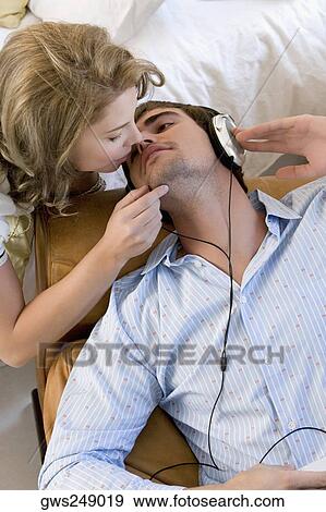 High angle view of a young couple romancing View Large Photo Image Stock Photo - High angle view of a young couple romancing. Fotosearch