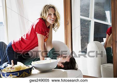 Portrait of a young couple romancing View Large Photo Image Stock Photography - Portrait of a young couple romancing. Fotosearch