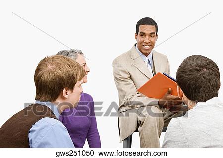 Business executives at a meeting View Large Photo Image Stock Image - Business executives at a meeting. Fotosearch