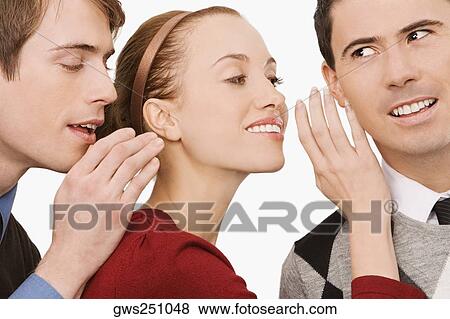 Business executives whispering to each other View Large Photo Image Stock Photo - Business executives whispering to each other. Fotosearch