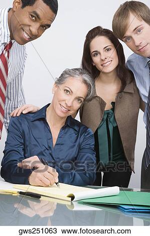 Portrait of business executives in a conference room View Large Photo Image Stock Image - Portrait of business executives in a conference room. Fotosearch