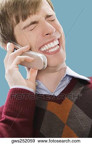 Close-up of a businessman talking on a mobile phone View Large Photo Image Stock Photo - Close-up of a businessman talking on a mobile phone. Fotosearch