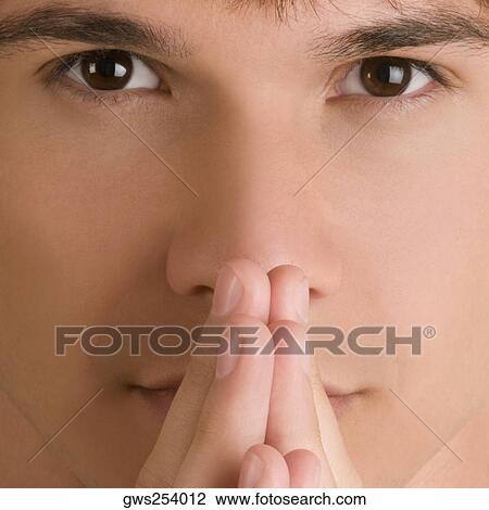 Portrait of a young man thinking View Large Photo Image Stock Image - Portrait of a young man thinking. Fotosearch