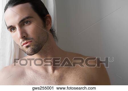 Close-up of a man thinking View Large Photo Image Stock Image - Close-up of a man thinking. Fotosearch