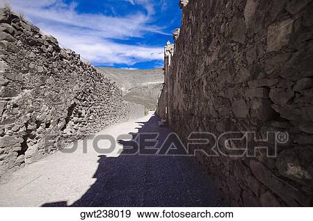 Stone wall along a street, Real De Catorce, San Luis Potosi, Mexico View Large Photo Image Stock Photo - Stone wall along a street, Real De Catorce, San Luis Potosi, Mexico. Fotosearch