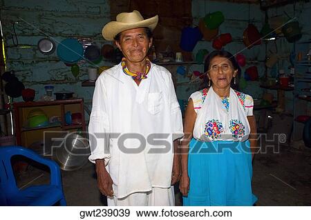 Portrait of a mature couple standing in a kitchen, Papantla, Veracruz, Mexico View Large Photo Image Stock Photo - Portrait of a mature couple standing in a kitchen, Papantla, Veracruz, Mexico. Fotosearch