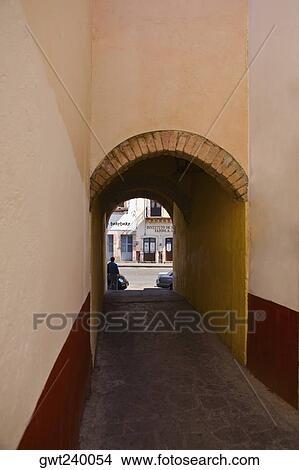 Alley passing through an archway, Alcaiceria De Gomez, Zacatecas State, Mexico View Large Photo Image Picture - Alley passing through an archway, Alcaiceria De Gomez, Zacatecas State, Mexico. Fotosearch