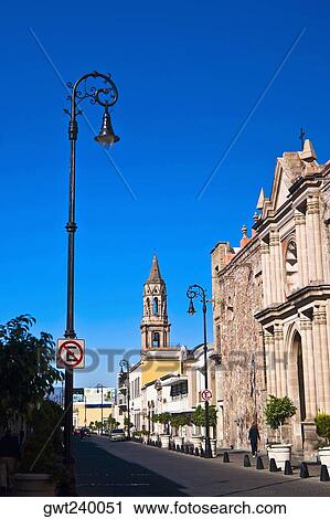 Buildings along a street, Venustiano Carranza Street, Aguascalientes, Mexico View Large Photo Image Stock Image - Buildings along a street, Venustiano Carranza Street, Aguascalientes, Mexico. Fotosearch