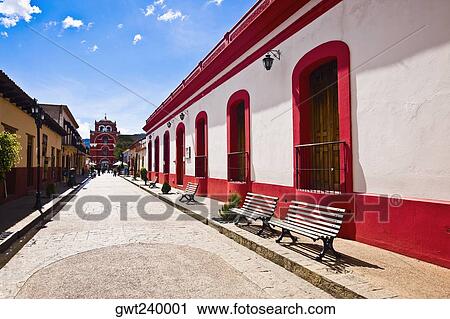 Buildings on both sides of a street, San Cristobal De Las Casas, Chiapas, Mexico View Large Photo Image Stock Image - Buildings on both sides of a street, San Cristobal De Las Casas, Chiapas, Mexico. Fotosearch