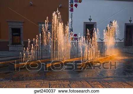 Fountains in front of a building, San Jose De Gracia, Aguascalientes, Mexico View Large Photo Image Stock Photo - Fountains in front of a building, San Jose De Gracia, Aguascalientes, Mexico. Fotosearch