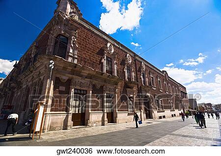 Group of people walking in front of a government building, Palacio De Gobierno, Aguascalientes, Mexico View Large Photo Image Stock Photograph - Group of people walking in front of a government building, Palacio De Gobierno, Aguascalientes, Mexico. Fotosearch